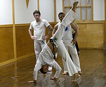 Common position both for scorpion and meia lua de compasso. Capoeira with Mestre Caxias-0451.jpg