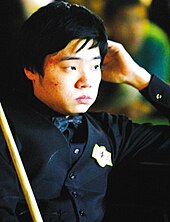 Ding Junhui (pictured in 2009) defeated Steve Davis 10-6 to become the first player from outside the British Isles to win the UK Championship. Ding Jun-hui.jpg