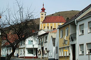 Town center with St. Martin's mountain church