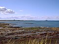 View towards Belhaven Bay (John Muir Country Park) with North Berwick Law and Bass Rock in the distance
