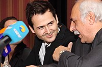A copyright dispute between Maya (left) and Eldar Mansurov (right) concerning the use of his 1989 composition "Bayatilar" was settled at a Baku press conference in January 2010 (pictured). Eldar Mansurov & Edward Maya (Romania).jpg