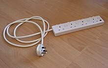 A power strip with power indicator and individual switches for each socket (UK) Extensioncord.jpg