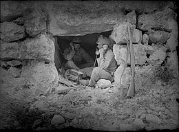 Austro-Hungarian field telephone crew equipped with the M.14 rifle at the Isonzo front in 1916 Feldtelefon-Station am Rombon.jpg