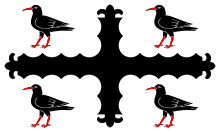 The Flag of Flintshire includes a cross engrailed sable. Flag of Flintshire.svg