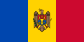The flag of Moldova, a charged vertical triband.