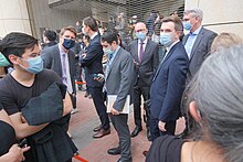 Foreign representatives waiting in line for the court hearing Foreign representative waiting to entry court 20210301.jpg