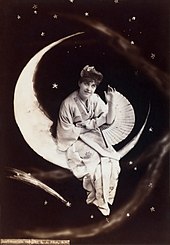 Geraldine Ulmar as Yum-Yum in the New York cast, captioned "We're very wide awake, the moon and I." Geraldine Ulmar in Gilbert and Sullivan's The Mikado - photograph only.jpg