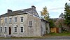 Gut Schnellwind (facades and roof of the residential part, facades and roof of the pigeon tower, facades and roof of the stables in the east, enclosure wall in the north and paving of the inner courtyard)