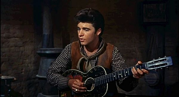 Ricky Nelson performing the song "Get Along Home, Cindy" in Rio Bravo