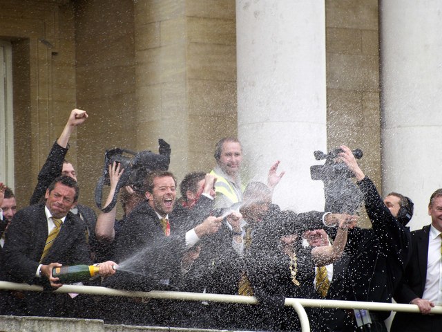 Phil Brown and players celebrate on promotion to the Premier League in 2008