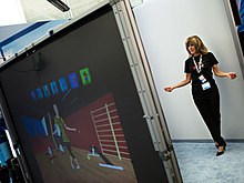 An Intel labs researcher demonstrating an augmented reality dressing room Intel Labs researcher Nola Donato demonstrates augmented reality dressing room.jpg