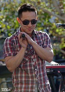 Jason Chen performing at the Americana at Brand in Glendale, California (2014)