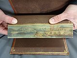 Lake surrounded by mountains and a castle with docking place and boats - Fore-edge painting, KW 1740 F1