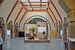 L. Hijo.  Interior de una sala bancaria en Helsinki (1904)