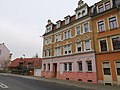 Apartment building in half-open development