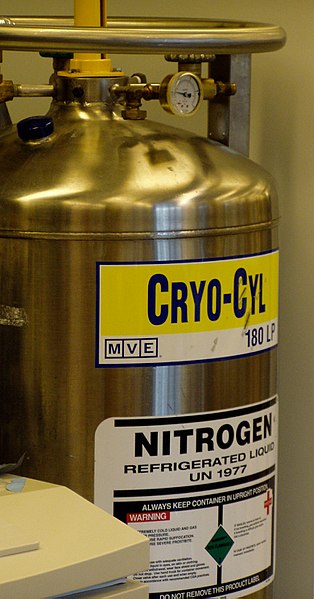 A tank of liquid nitrogen, used to supply a cryogenic freezer (for storing laboratory samples at a temperature of about −150 °C)
