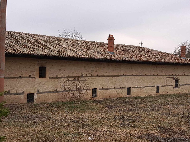 File:Low windows of the dug-in church in Poroishte.jpg