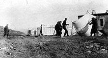 Marconi watching associates raising the kite (a "Levitor" by B.F.S. Baden-Powell ) used to lift the antenna at St. John's, Newfoundland, December 1901 Marconi at newfoundland.jpg