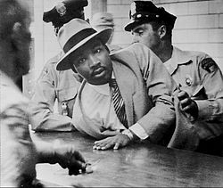 250px-Martin_Luther_King%2C_Jr._Montgomery_arrest_1958.jpg