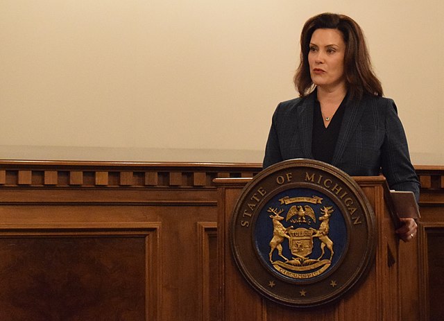 Whitmer speaking at a National Guard ceremony, January 2019