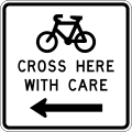 (A43-3) Cyclists Cross Here With Care (to the left)