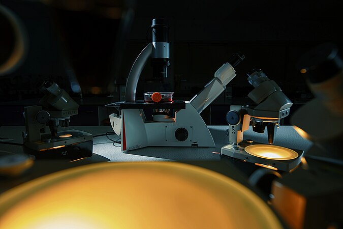 A new microscope model surrounded by old microscopes from the 1960s. Photo by Artem Popovich