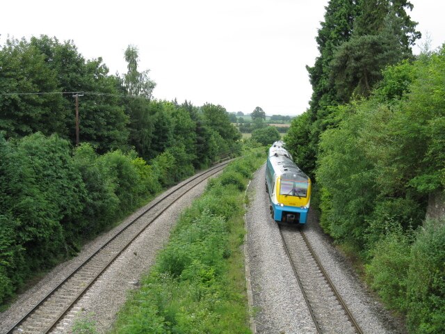 A Class 175 'Coradia' running through currently closed Dinmore railway station, Herefordshire on the Welsh Marches Line on an Arriva Trains Wales serv