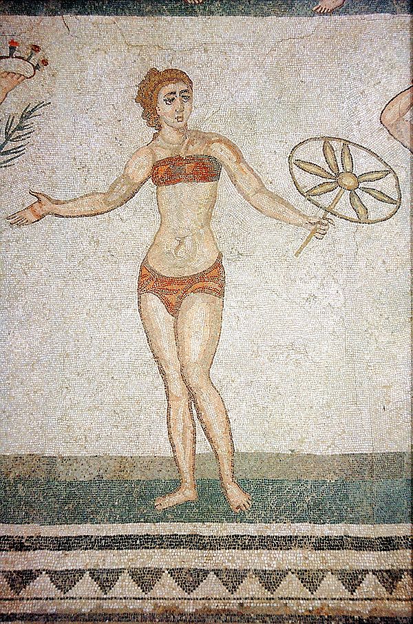 A mosaic from the Piazza Armerina in Sicily showing a woman wearing a strophium (breastcloth) and a subligaculum