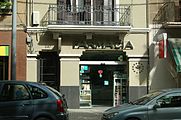 *1929-Pujades 247. Camarillas (Miquel), taverna.*1942-Pujades 247. Jornet (A), farmàcia.*1952-Pujades 247. Jornet (Artur), farmàcia.*1961-Pujades 247. Xalabarder Olivella (Eduard), farmàcia.*2010-Pujades 247. Una farmàcia.