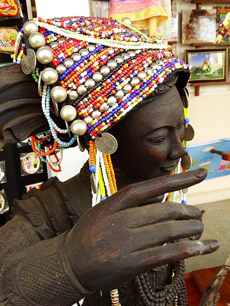 File:Sculpture with Headdress - Outside National Museum - Yangon - Myanmar (Burma) (11774277154).jpg