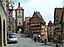 Photo of a famous street in Rothenburg ob der Tauber at Koboldzellersteig and Spittalgasse.