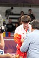 Deutsch: Tischtennis bei den Olympischen Jugendspielen 2018; Tag 9, 15. Oktober 2018; Mixed Medaillenzeremonie - Gold: Yingsha Sun & Wang Chuqin (CHN), Silber: Miu Hirano & Tomokazu Harimoto (JPN), Bronze: Su Pei-ling & Lin Yun-ju (TPE)); Medaillen-Verleiher: IOC member Ryu Seung-minu (KOR), Maskottchen-Verleiher: ITTF Vice-Presiden Nestor Tenca (ARG) English: Table tennis at the 2018 Summer Youth Olympics at 15 October 2018 – Mixed Medal Ceremony - Gold: Yingsha Sun & Wang Chuqin (CHN), Silver: Miu Hirano & Tomokazu Harimoto (JPN), Bronze: Su Pei-ling & Lin Yun-ju (TPE)); Medal presenter: IOC member Ryu Seung-minu (KOR), Mascot presenter: ITTF Vice-Presiden Nestor Tenca (ARG)