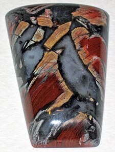 Cabochon of Tabu Tabu jasper (brecciated, with angular clasts cemented by grey chalcedony) South Africa