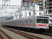 An 8-car set on the Toyoko Line in February 2007 Tokyu1000 8cars.jpg