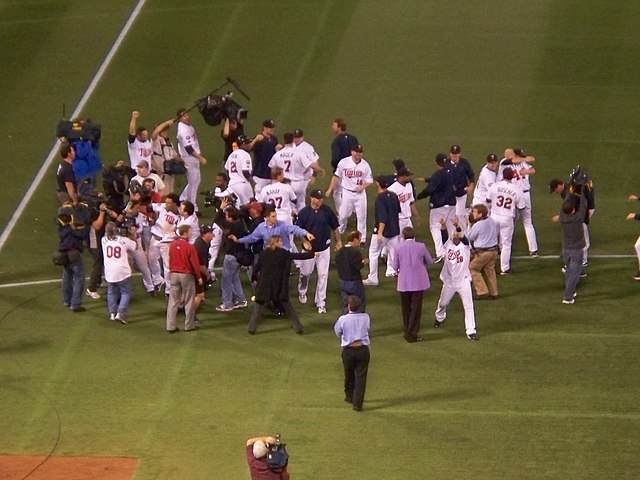 Minnesota Twins celebrate division tiebreaker victory over the Detroit Tigers.