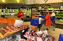 Two military brats shopping at the commissary, located in the military base. Bases are often self-contained towns, with shopping, schools, hospitals, recreation centers, movie theaters, etc. US Navy 020813-N-3235P-520 shopping at the commissary.jpg