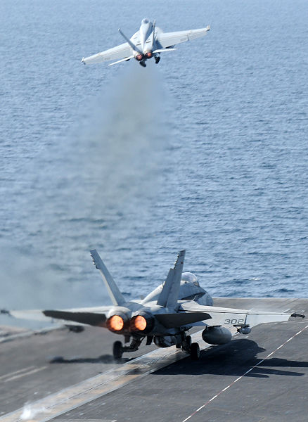 File:US Navy 120216-N-XC743-112 An F-A-18C Hornet assigned to the Vigilantes of Strike Fighter Squadron (VFA) 151 and an F-A-18E Super Hornet assigned t.jpg