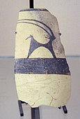 Fragment of pottery with a painting of an Ibex; 4700–4200 BC; painted ceramic; from Girsu; Louvre[38]