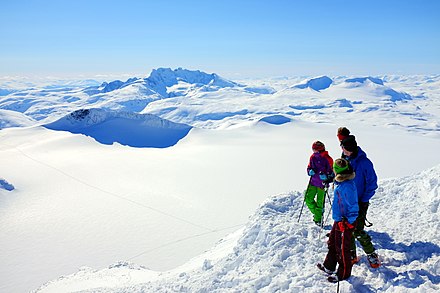 Jotunheimen in mid April, covered in deep fresh snow; skiing is the only realistic option.