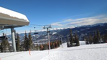 The Falcon SuperChair (replaced in 2017) services a variety of advanced trails, ranging from groomed blacks to glades on the north side and chutes on the south side View from top of Falcon SuperChair.JPG