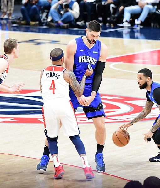 File:Vucevic setting a screen against Thomas, Magic vs Wizards on January 1, 2020 (cropped).jpg