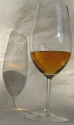 Tears of wine show clearly in the shadow of this glass of 13.5% Caluso Passito dessert wine Wine legs shadow.jpg