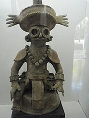 Incense burner that represents K'inich Yax K'uk' Mo'. Yax Kuk Mo.jpg