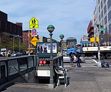 Northbound street stair and elevator 135 Lenox IRT sta jeh.JPG