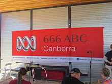 2CN banner displayed at floriade for an outside broadcast in 2013 2CN ABC banner Floriade Canberra 2013 outside radio broadcast Australia Broadcasting Corporation.JPG