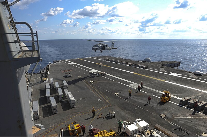 File:A U.S. Navy MH-60S Seahawk helicopter attached to Helicopter Sea Combat Squadron (HSC) 22 unloads ammunition onto the flight deck of the aircraft carrier USS Dwight D. Eisenhower (CVN 69) in the Atlantic Ocean 130806-N-FI568-009.jpg