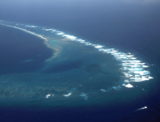 Vista aérea de la parte sureste de Kingman Reef.png