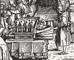 Paul Hofhaimer playing the Apfelregal, detail from Emperor Maximilian hearing Mass, by Hans Weiditz, 1518. Apfelorgel 01.jpg