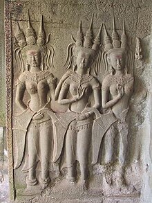 A bas relief at the 12th-century temple of Angkor Wat in Cambodia showing apsara temple dancers. Apsara relief.jpg