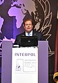 Bill (F. William) Conner, President and CEO of Entrust, speaking on global cybersecurity before the INTERPOL 79th General